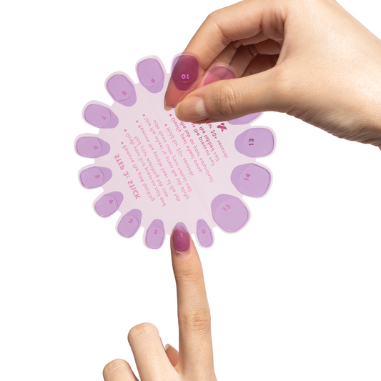 Super Stick Tab Pack showing hands selecting adhesive nail tabs from circular array with printed instructions