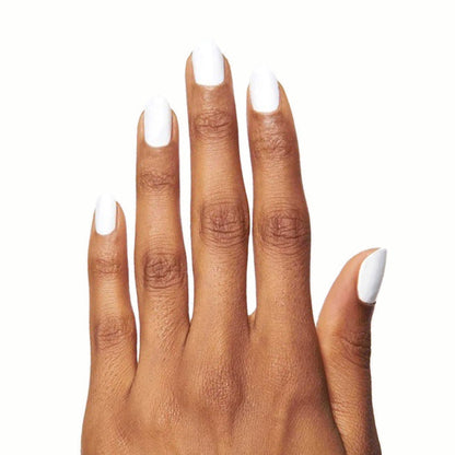 Hand with nails painted in crisp white HD polish showcasing a clean, fresh manicure on medium skin tone