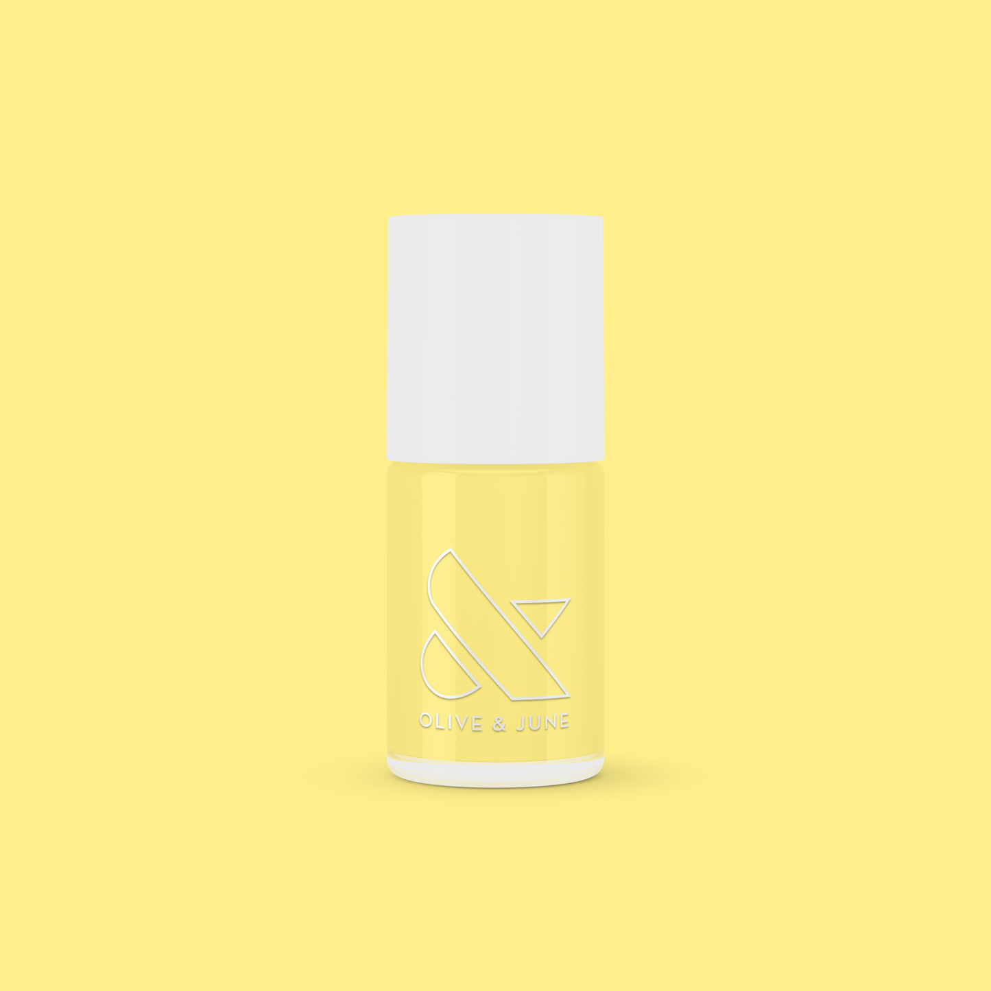 Bright & Focused yellow gel polish bottle by Olive and June for a creative, long-lasting at-home manicure or mani.