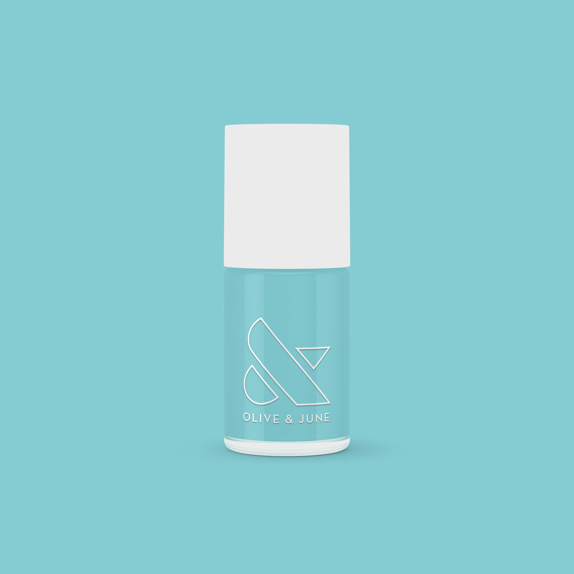 Bottle of Yes Please nail polish in a turquoise shade by Olive and June for vibrant, long-lasting manicures