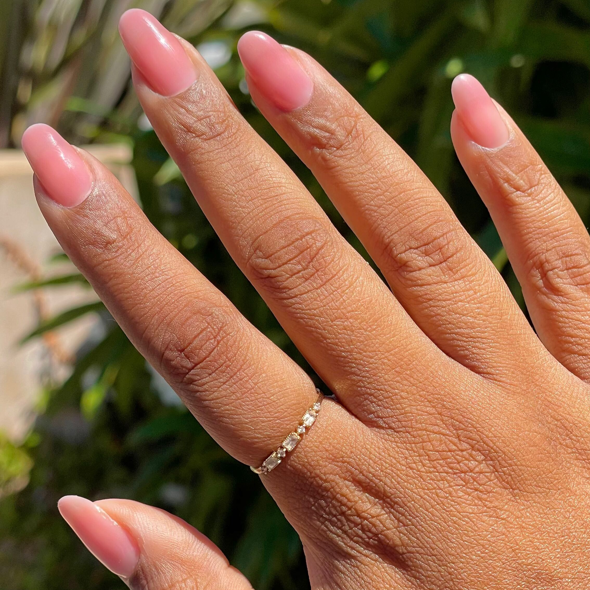 Blush Jelly - Builder Gel on natural nails with a smooth sheer rosy pink mani in natural sunlight outdoors