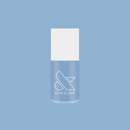 Olive and June gel polish bottle in Shades of Seersucker, a vibrant periwinkle blue for a fresh summer mani look