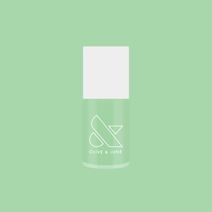Bottle of Olive and June Aced It nail polish in cool pastel green for quick-dry and long-lasting mani looks