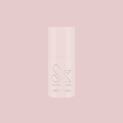 CCT - Gel polish bottle on a soft pink background for a feminine, sheer gel manicure by Olive and June
