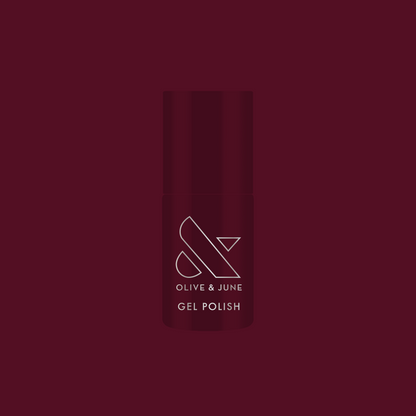 Obsessed - Gel bottle shown in a deep dark ruby shade for a rich, long-lasting gel manicure by Olive and June