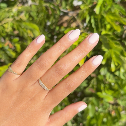 Brave Blush pastel pink gel polish on almond-shaped nails with a smooth, glossy finish for an easy mani