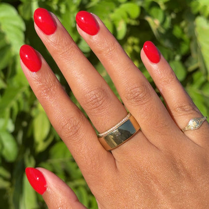 CV - Gel on natural nails in a bright cherry red shade for a smooth, long-lasting gel manicure by Olive and June