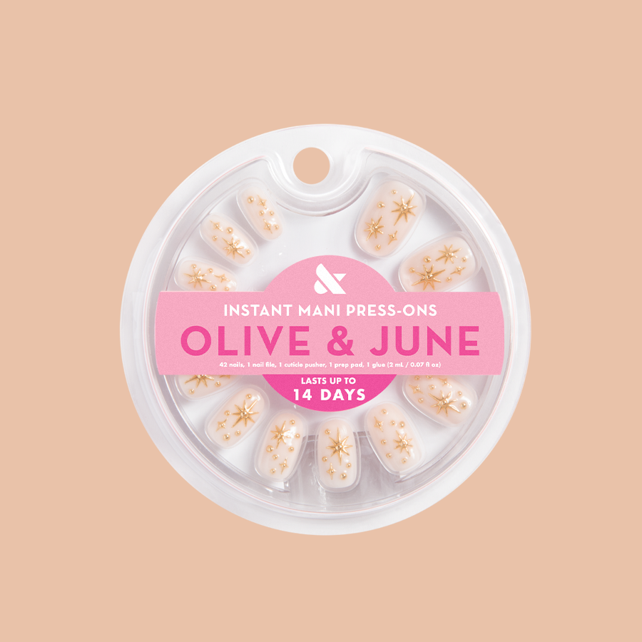 Confetti Sparkle - Press-On | Short | Round false nails with milky neutral base and starry gem sparkles for easy at-home mani