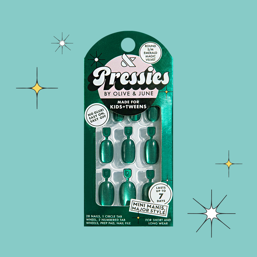 Emerald Magic Velvet - Pressies | Short Medium | Round showing deep green shimmering cat eye press-on nails in packaging