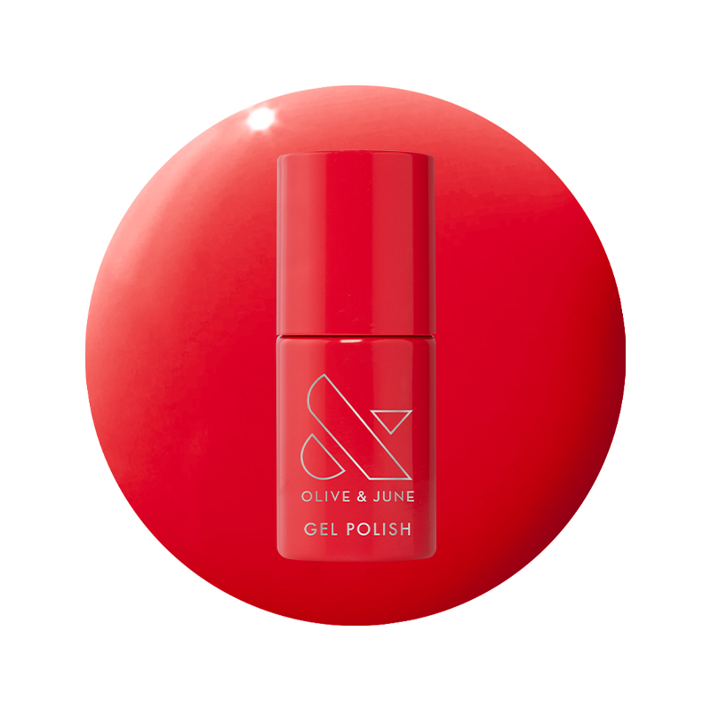 Bottle of Field Day - Gel polish in vibrant watermelon red shade on matching red background