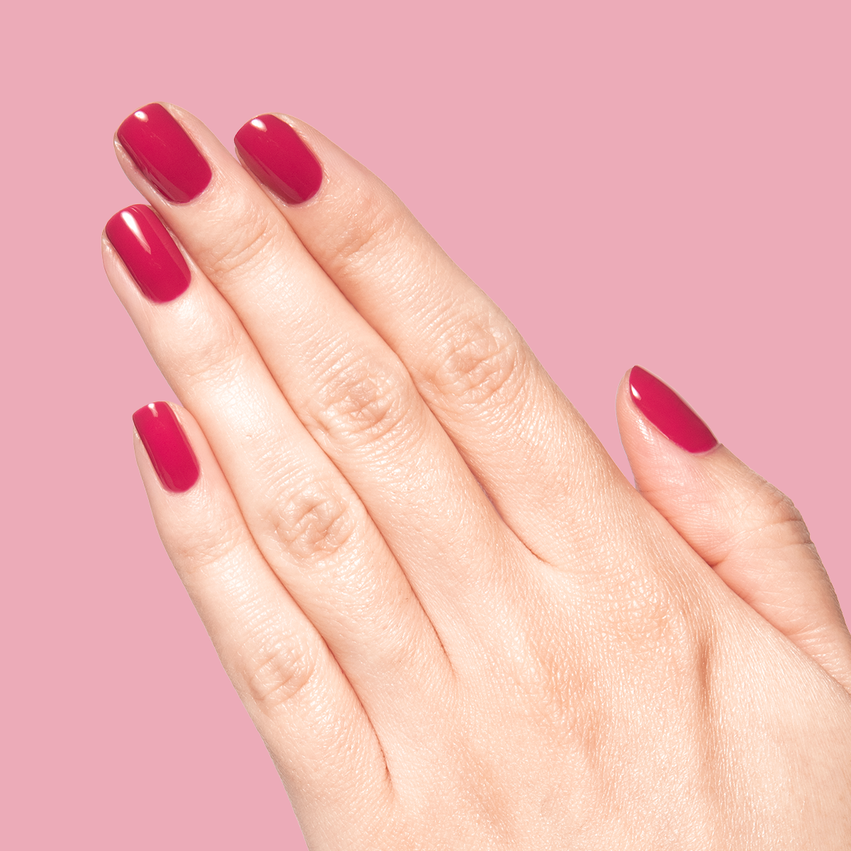 JG - Gel on medium-length nails in a rich berry shade for a vibrant, long-lasting gel polish mani by Olive and June