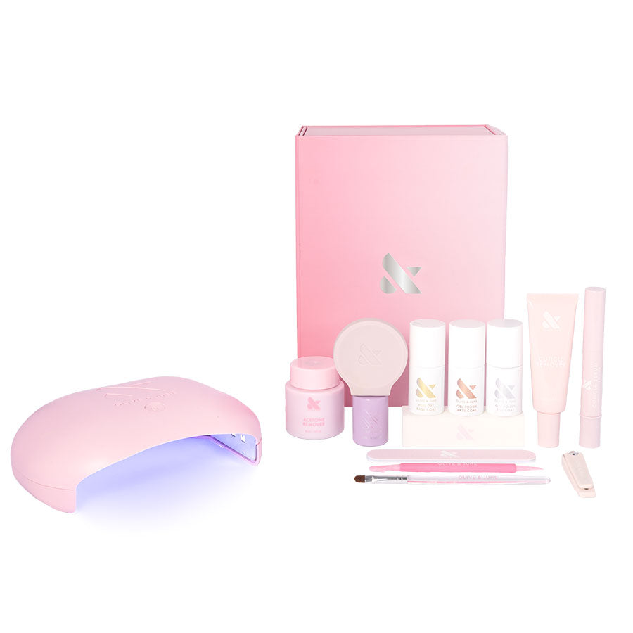 The Gel Mani System - 6 with pink UV lamp, nail care tools, base and top gel polishes, remover, and manicure brushes kit
