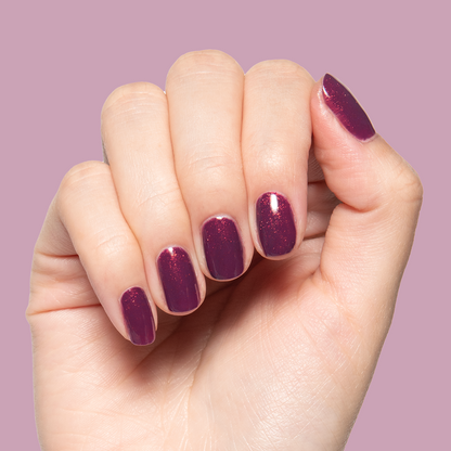 On the Promenade - Gel on short nails in shimmering mulberry purple for a sparkling long-lasting manicure by Olive and June
