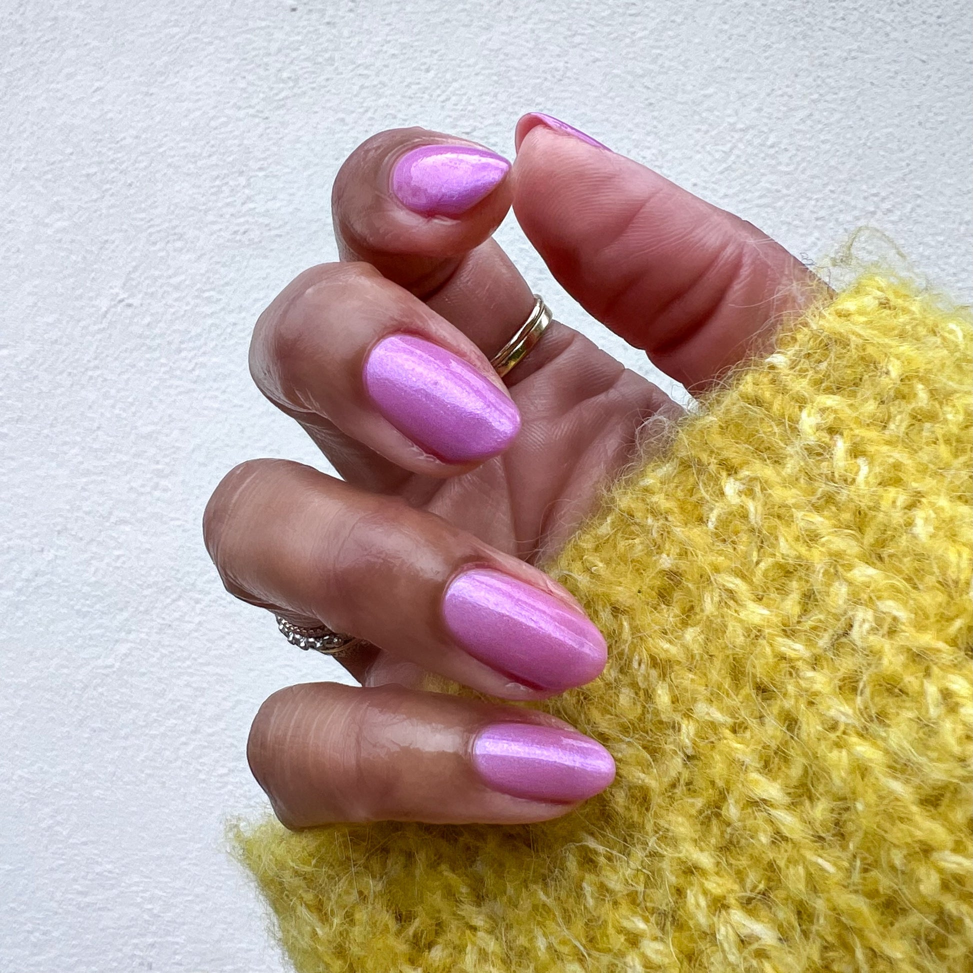 Island Time shimmery lilac purple gel polish on natural nails for a smooth, long-lasting at-home manicure by Olive and June