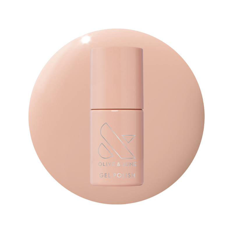 Bottle of KAG - Gel gel polish in neutral peachy pink shade on matching peach background