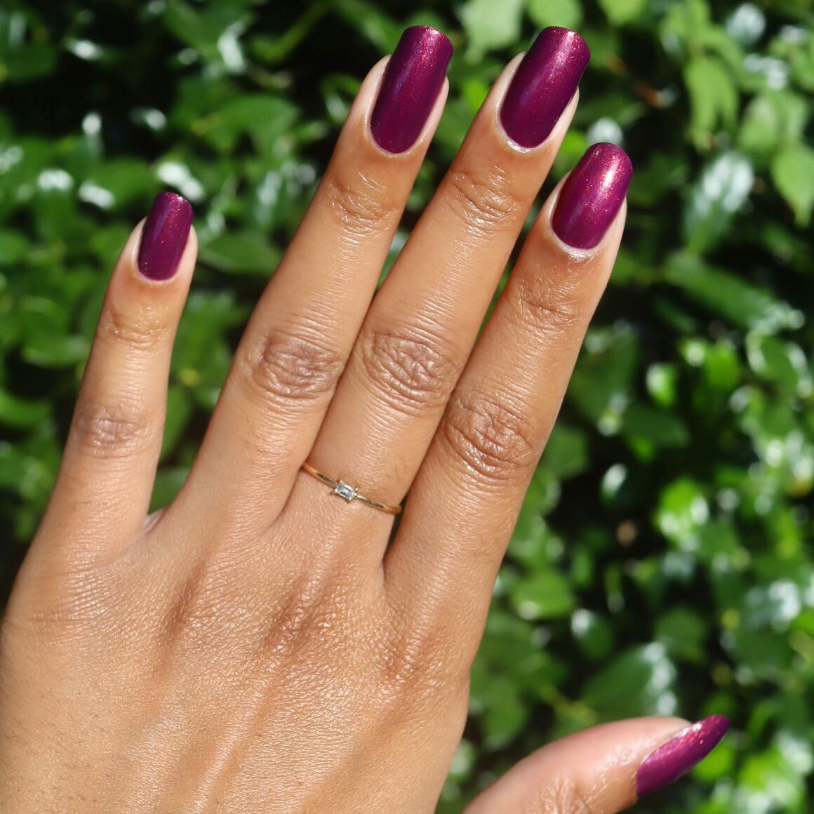 On the Promenade - Gel on medium-length nails in shimmering mulberry purple for a radiant manicure by Olive and June