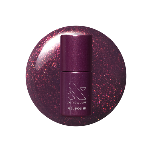On the Promenade - Gel bottle on shimmering mulberry purple gel polish for a sparkling mani by Olive and June