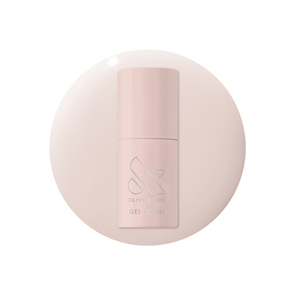 Bottle of Olive and June Dream Job - Gel polish in milky sheer pink with matching color background