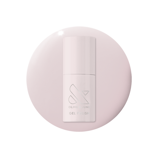 Sculpture Wing - Gel polish bottle on a smooth lavender neutral grey background for mani or pedicure use