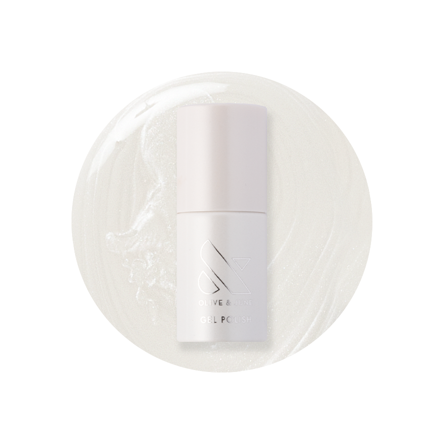 Atlas - Gel polish bottle on pearly white gel polish background for a clean and elegant manicure by Olive and June