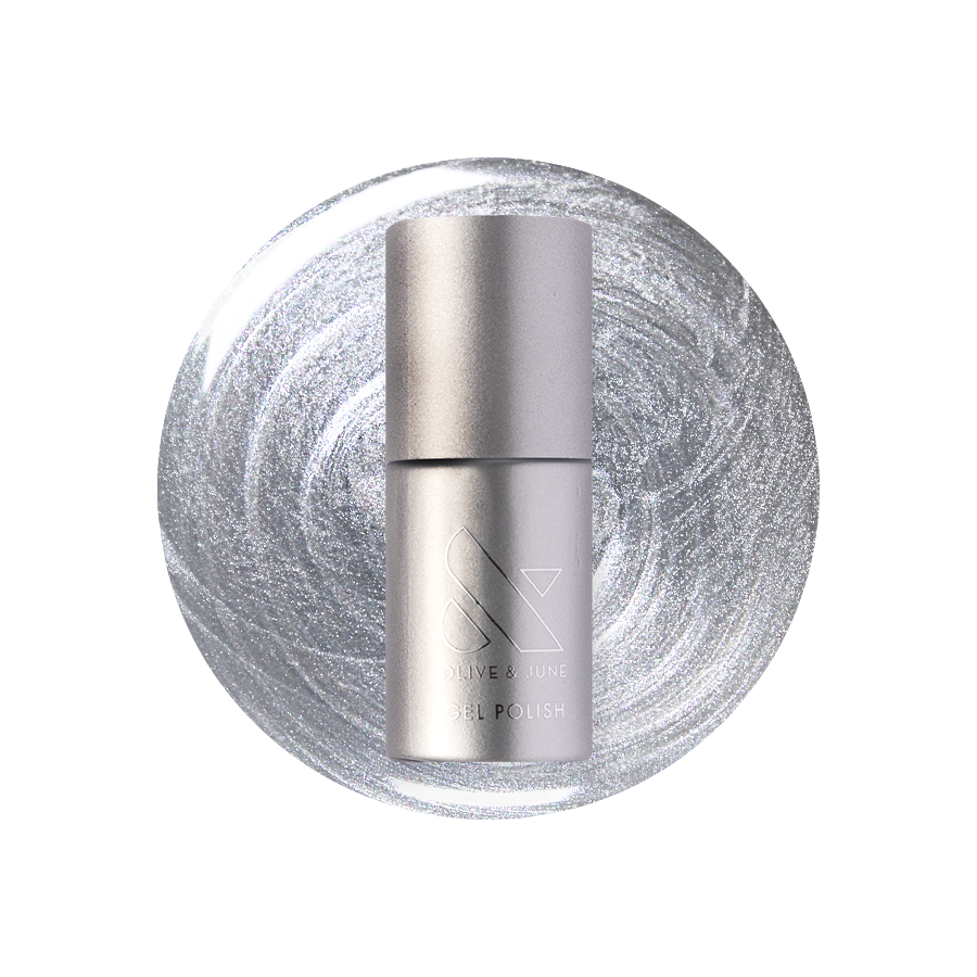 Cosmic Silver - Gel bottle shown on a metallic silver polish background for a long-lasting mani by Olive and June