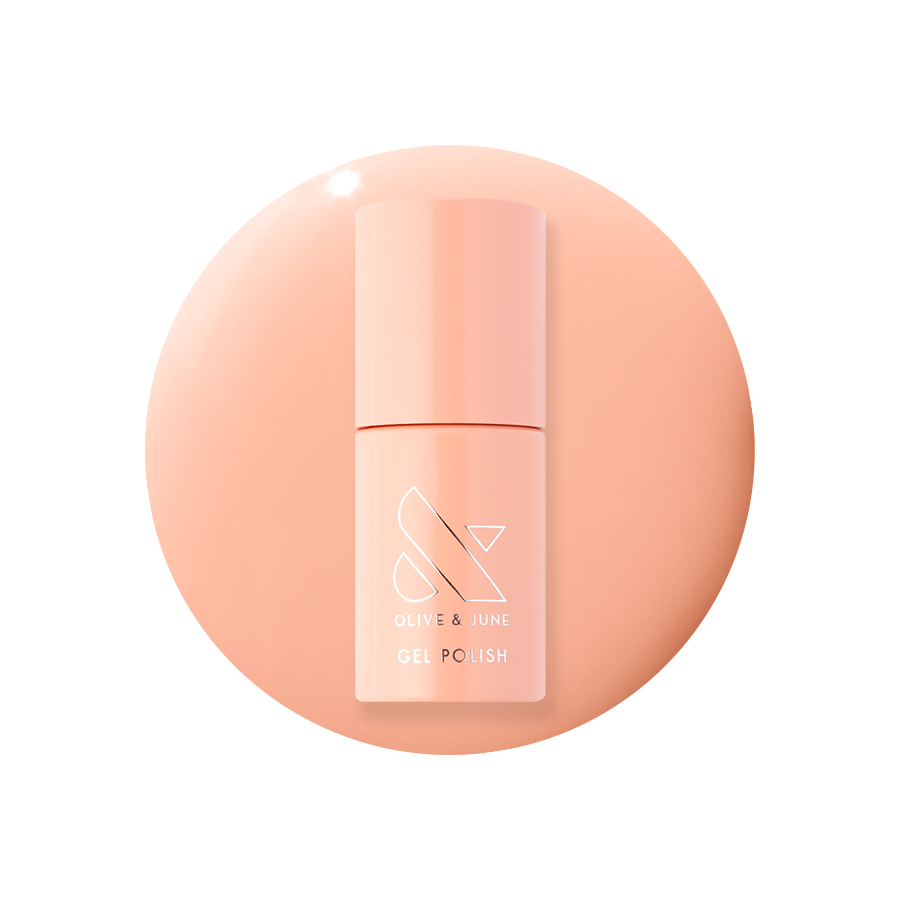 CS - Gel bottle shown in a soft coral peach shade for a fresh, petal-soft gel polish manicure look at home