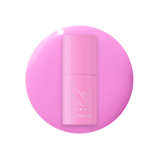 Permanent Vacation - Gel bright pink gel polish bottle on matching pink background for a mani or pedicure