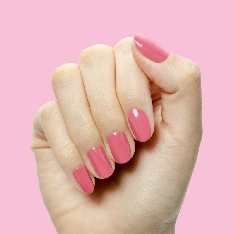 Prom - Gel shown on nails in a bold magenta pink shade for a vibrant, long-lasting at-home manicure by Olive and June