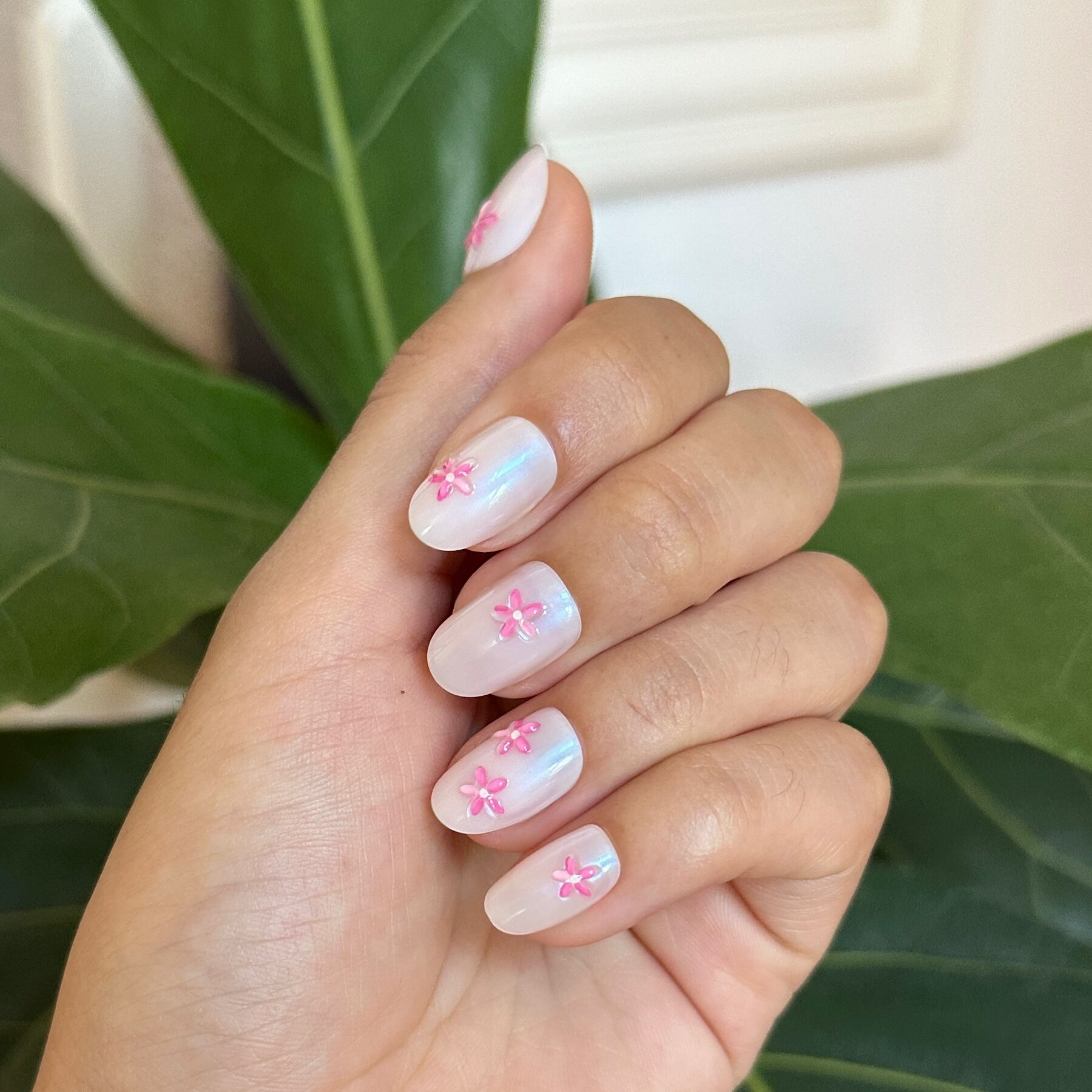 Puffy Petal Iridescent - Press-On | Short | Round sheer iridescent nails with raised pink floral details for a quick mani