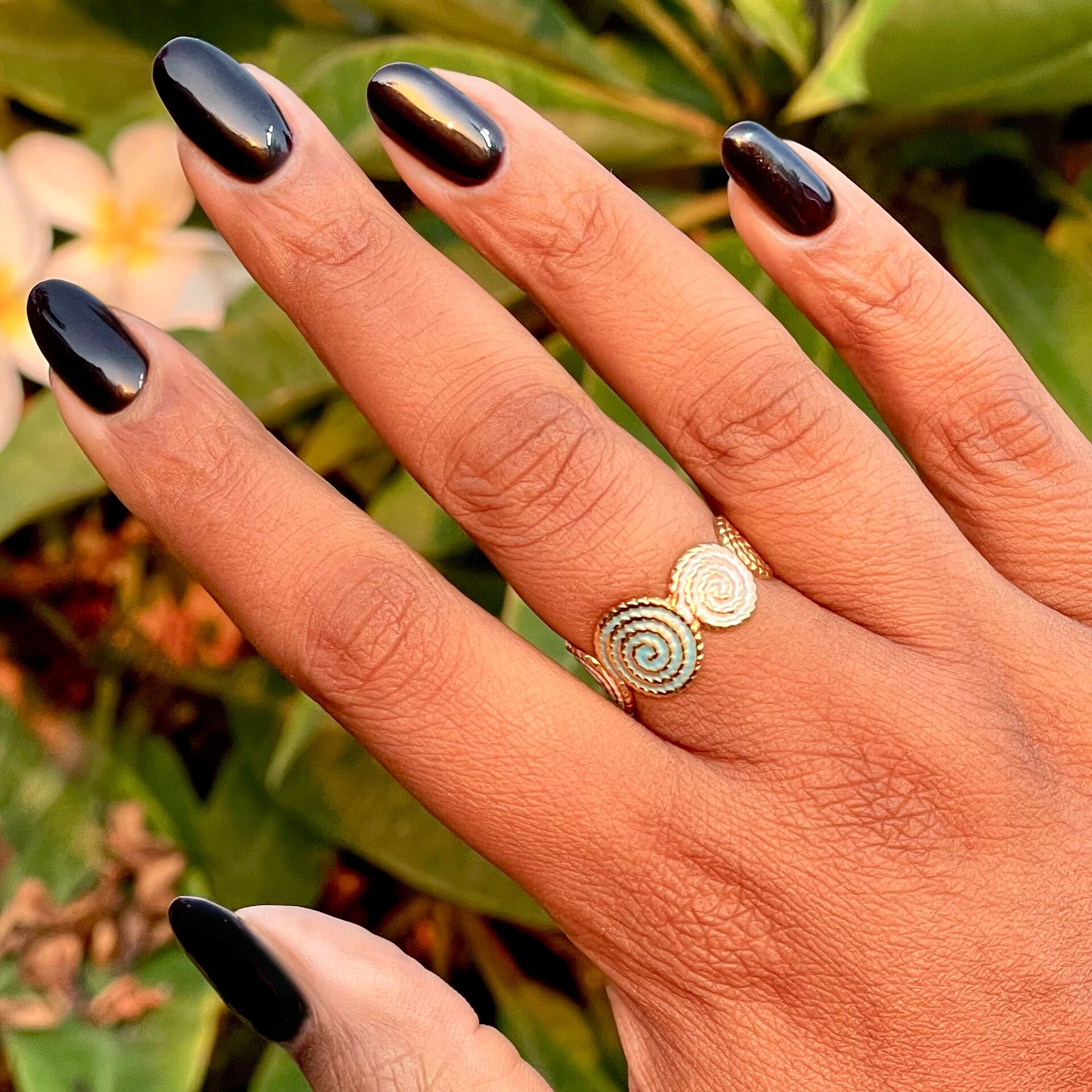 SD - Gel on medium-length oval nails in a glossy, deep plum shade for a polished at-home manicure by Olive and June