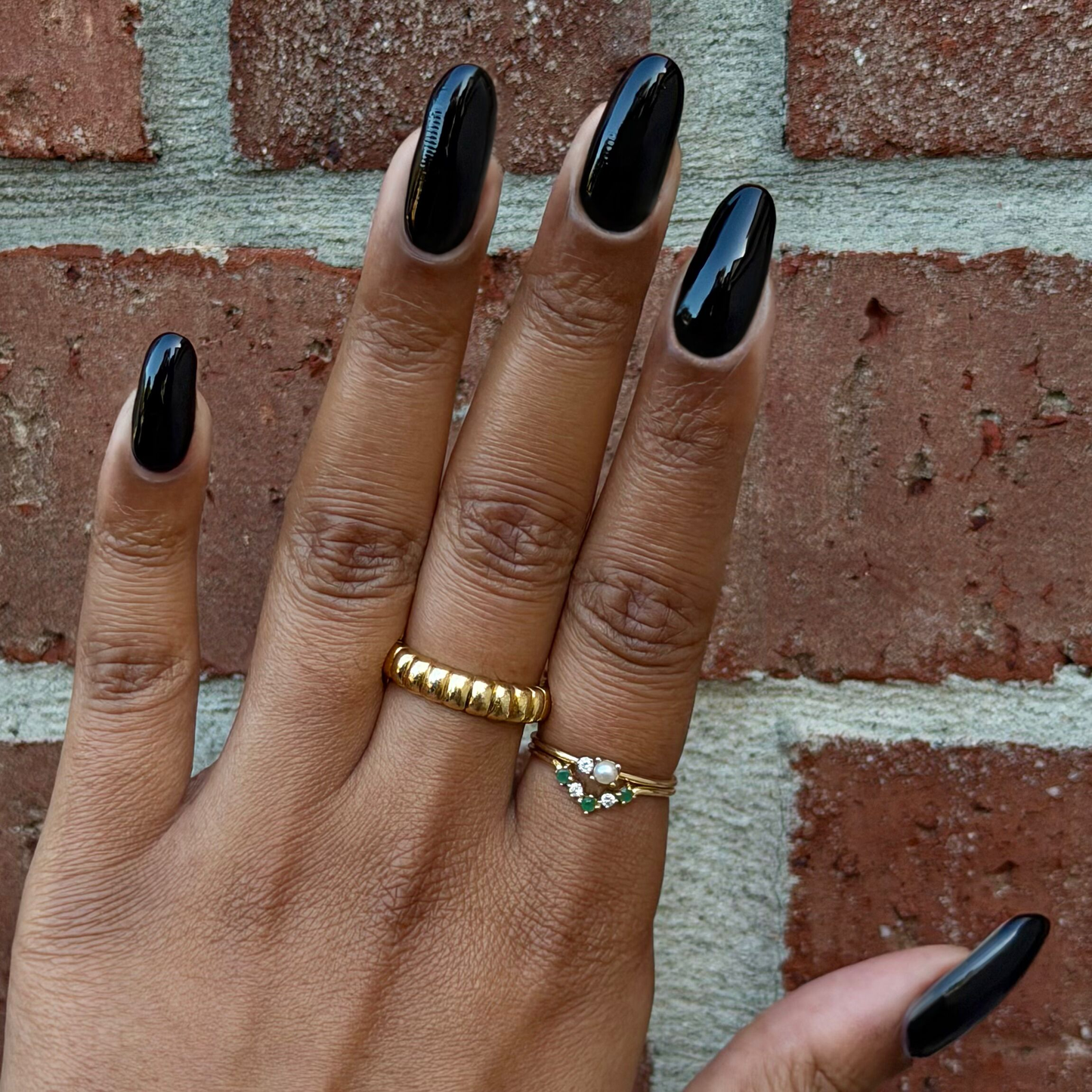 Shop Til You Drop Gel on medium-length natural nails in a glossy near-black vampy red manicure by Olive and June