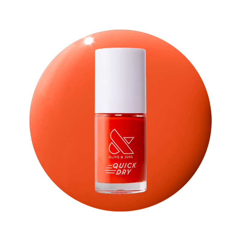 Snapdragon bright orange-red quick dry gel polish bottle on matching vibrant orange-red background