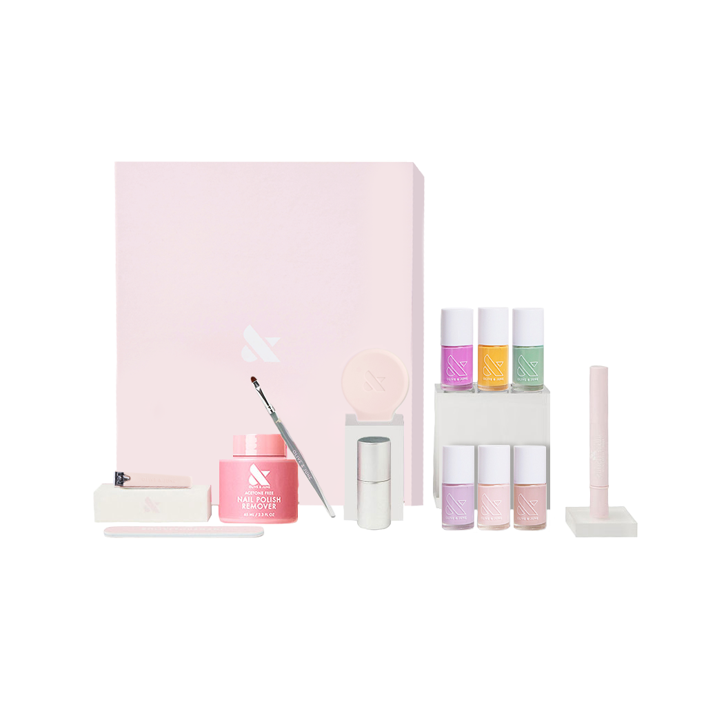 The Mani System nail care set with polish remover, brush, six polish shades, and tools for easy at-home manicures