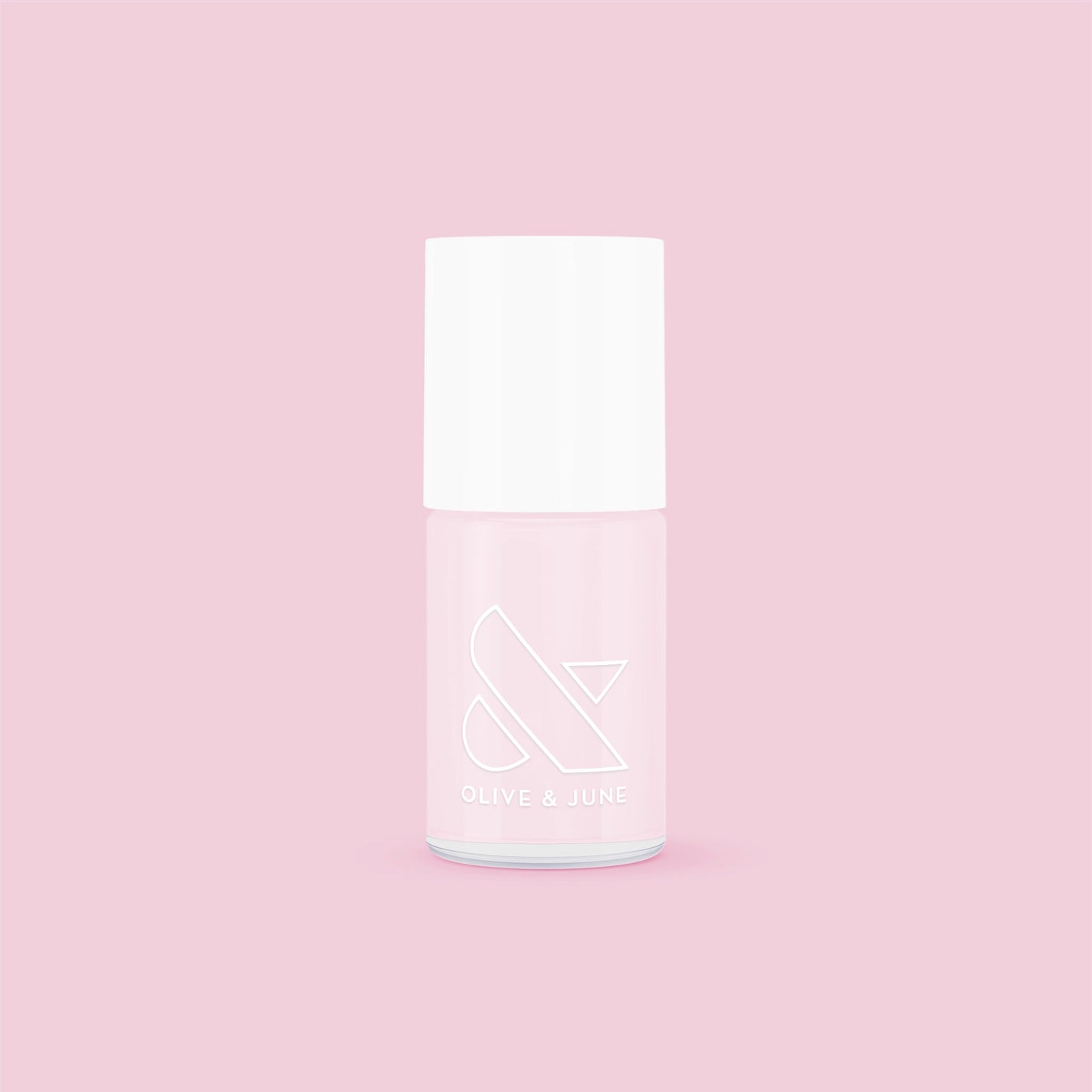 Olive and June Strawberry Scone nail polish bottle on pink background for sheer pink long-lasting mani