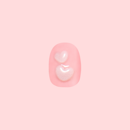 3D Crystal Hearts - Press-On | Extra Short | Round baby pink nail with raised puffy hearts for easy at-home mani