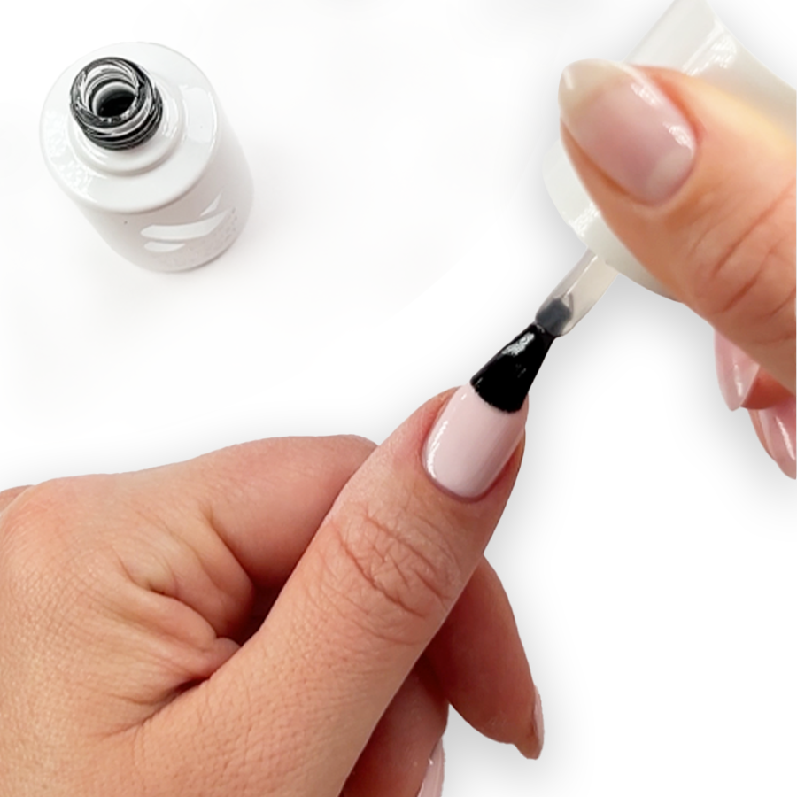 Applying Gel Top Coat on natural nail for a glossy, long-lasting manicure with smooth gel polish finish at home