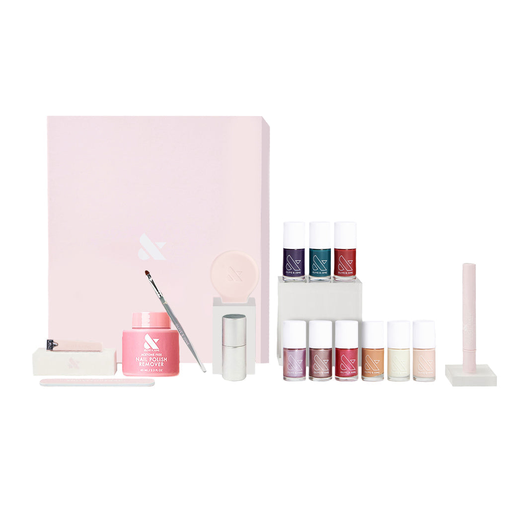 The Mani System nail care set with multiple polish shades and manicure tools for complete at home nail treatments