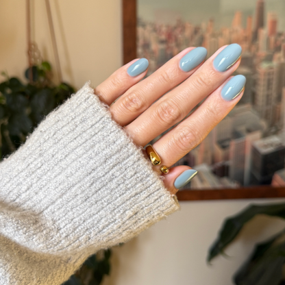 Vintage - Gel shown on hand with smooth vintage denim blue nails for a chic, long-lasting manicure by Olive and June