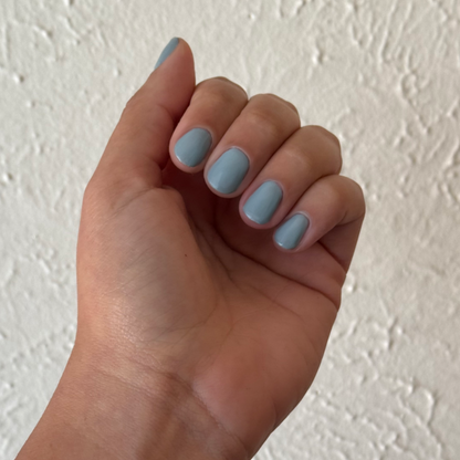 Vintage - Gel shown on hand with smooth vintage denim blue nails for a classic, long-lasting gel polish manicure by Olive and June